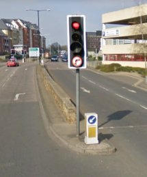 A bollard with a keep-left sign, just outside Georgie Bumble's Office (Google Street View Apr 2009)